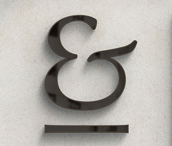 A curly wooden ampersand