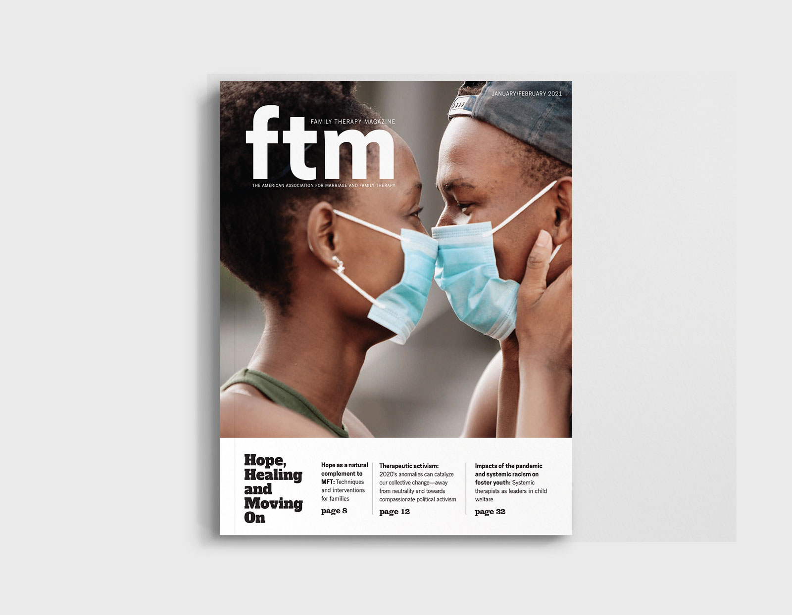 A cover of Family Therapy Magazine featuring a young black couple nose to nose wearing medical masks